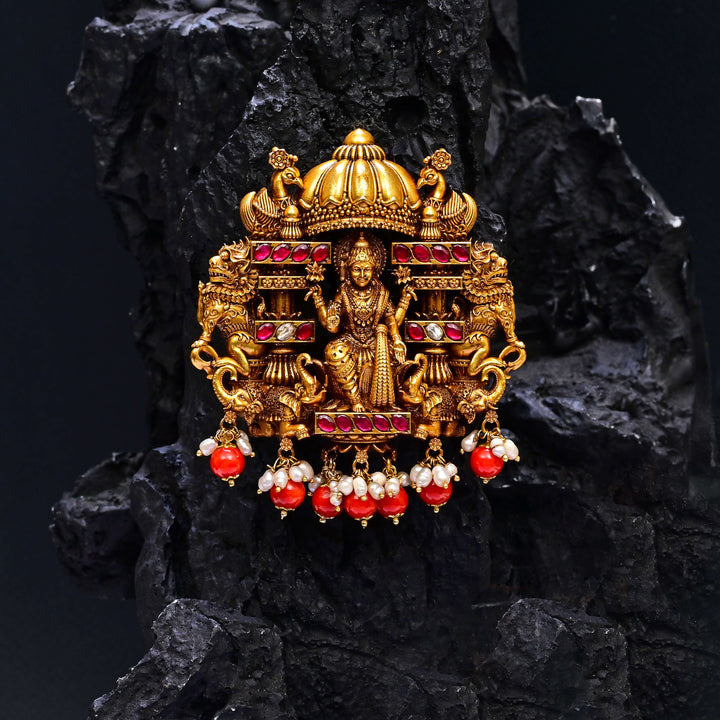 Premium 92.5 silver temple pendant featuring traditional Lakshmi motif, kemp stones, antique finish and intricate handcrafted South Indian design by Sri Fine Jewellery, Hyderabad.
(https://www.srifinejewellery.com)