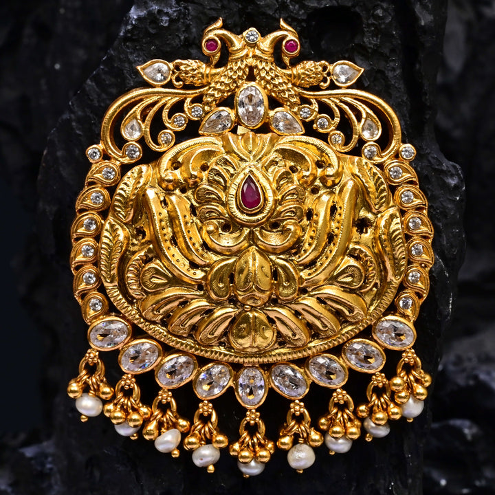Premium 92.5 silver temple pendant featuring traditional Lakshmi motif, kemp stones, antique finish and intricate handcrafted South Indian design by Sri Fine Jewellery, Hyderabad.
(https://www.srifinejewellery.com)