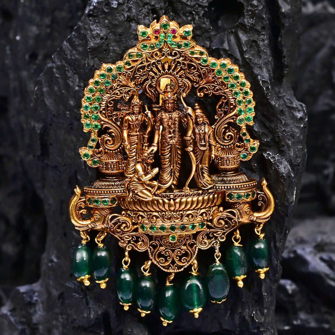 Premium 92.5 silver temple pendant featuring traditional Ram parivar, kemp stones, antique finish and intricate handcrafted South Indian design by Sri Fine Jewellery, Hyderabad.
(https://www.srifinejewellery.com)