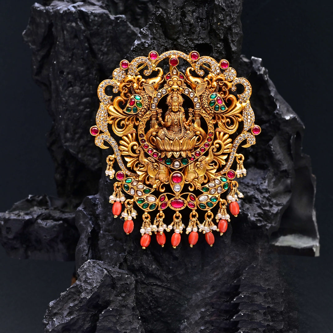 Premium 92.5 silver temple pendant featuring traditional Lakshmi motif, kemp stones, antique finish and intricate handcrafted South Indian design by Sri Fine Jewellery, Hyderabad.
(https://www.srifinejewellery.com)