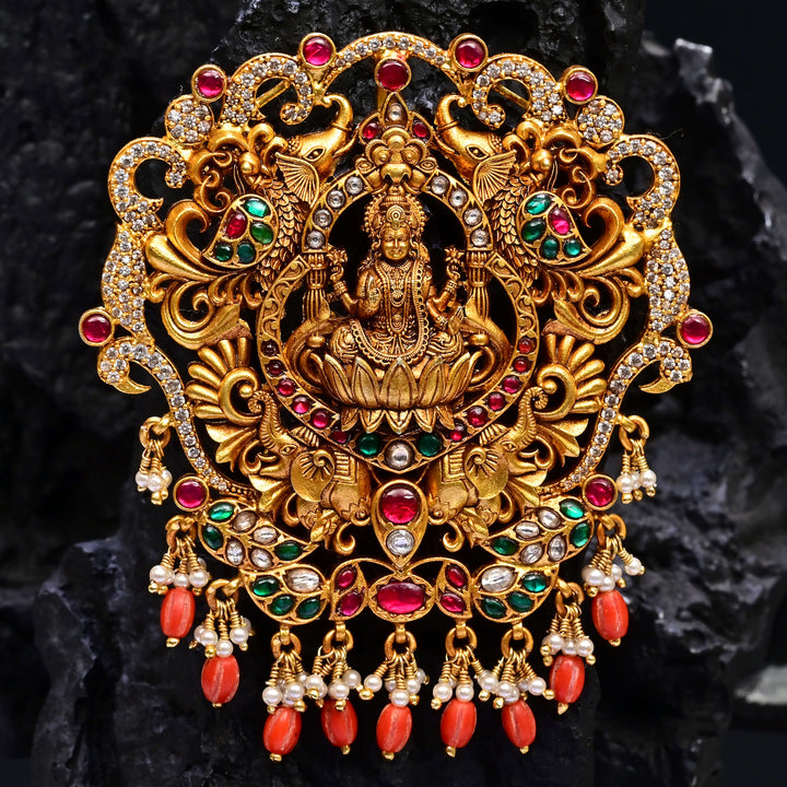 Premium 92.5 silver temple pendant featuring traditional Lakshmi motif, kemp stones, antique finish and intricate handcrafted South Indian design by Sri Fine Jewellery, Hyderabad.
(https://www.srifinejewellery.com)