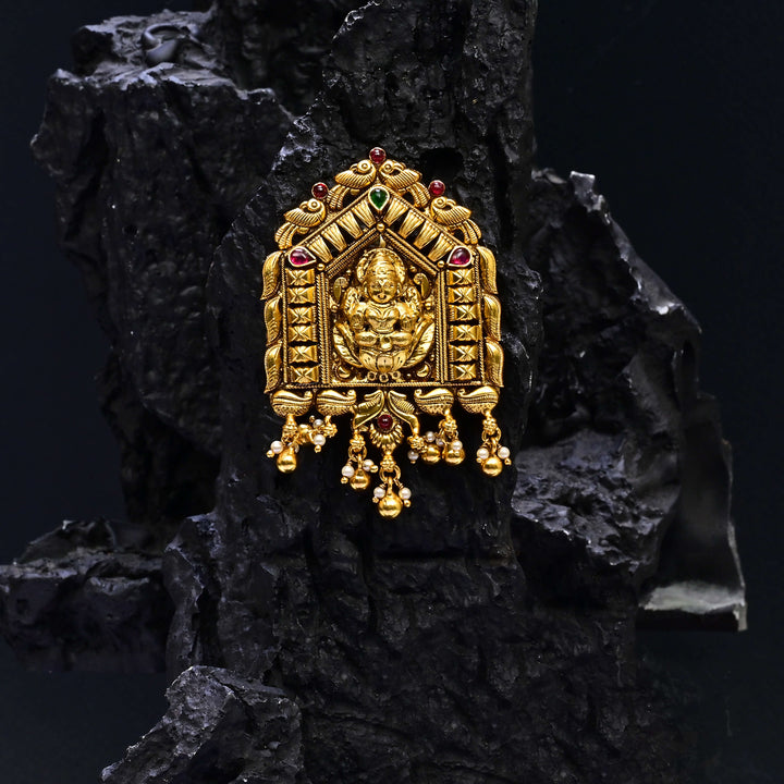 Premium 92.5 silver temple pendant featuring traditional Lakshmi motif, kemp stones, antique finish and intricate handcrafted South Indian design by Sri Fine Jewellery, Hyderabad.
(https://www.srifinejewellery.com)