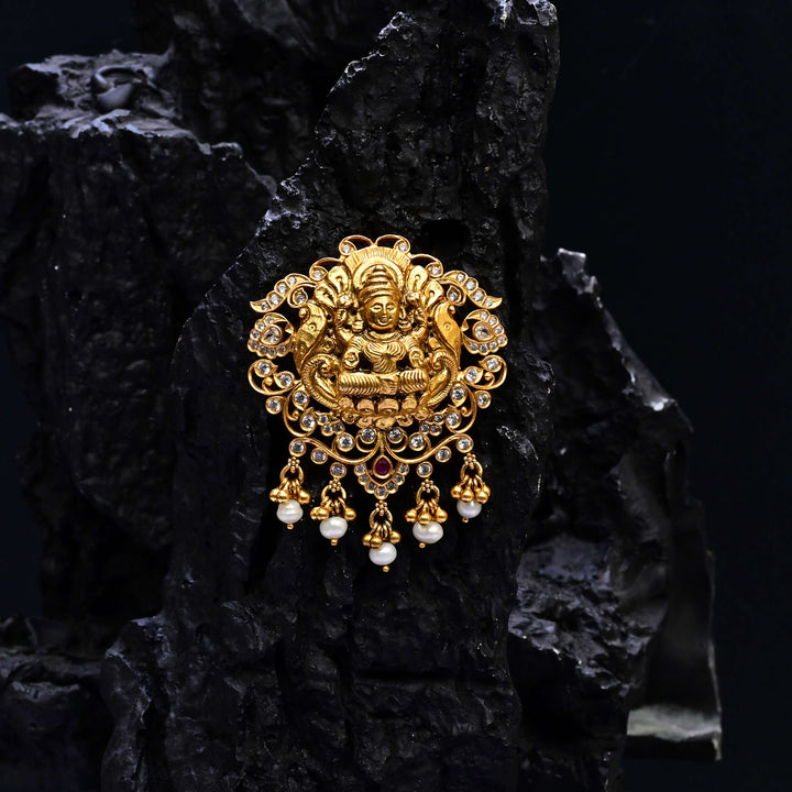 Premium 92.5 silver temple pendant featuring traditional Lakshmi motif, kemp stones, antique finish and intricate handcrafted South Indian design by Sri Fine Jewellery, Hyderabad.
(https://www.srifinejewellery.com)