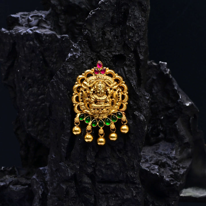Premium 92.5 silver temple pendant featuring traditional kemp stones, antique finish, Lakshmi motif and intricate handcrafted South Indian design by Sri Fine Jewellery, Hyderabad.
(https://www.srifinejewellery.com)