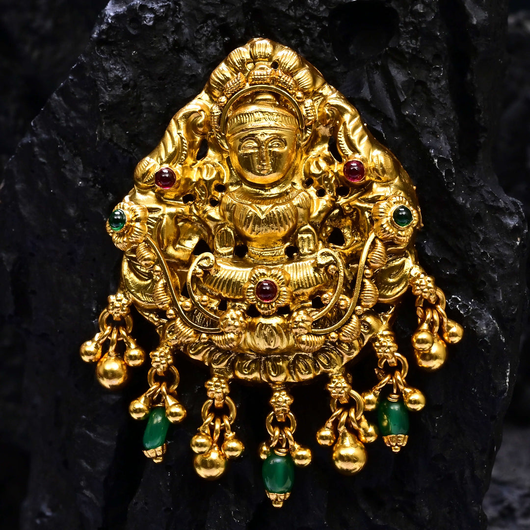 Premium 92.5 silver temple pendant featuring traditional Lakshmi motif, antique finish, and intricate handcrafted South Indian design by Sri Fine Jewellery, Hyderabad.
(https://www.srifinejewellery.com)