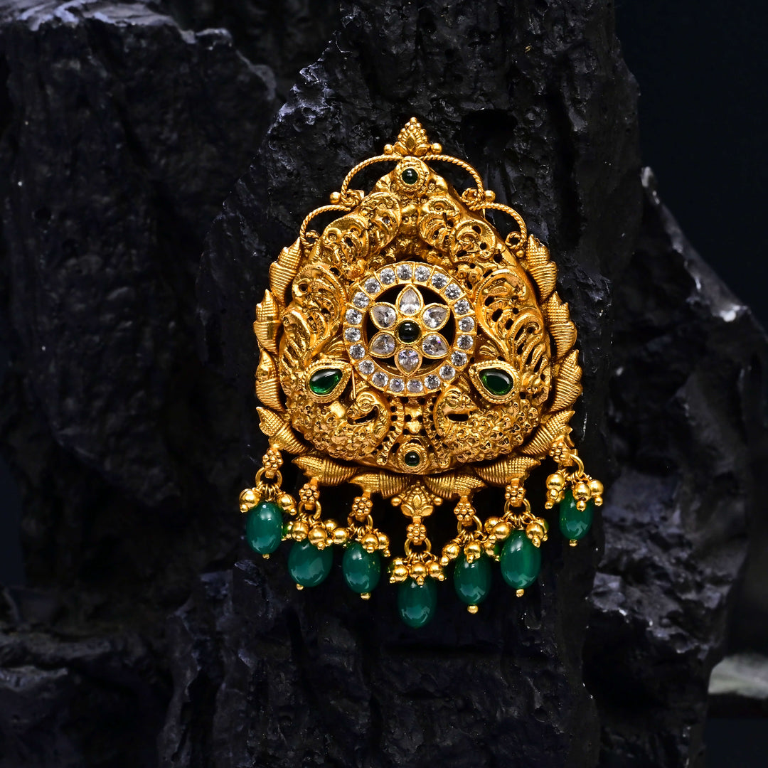 Premium 92.5 silver temple pendant featuring traditional emerald kemp stones antique finish, and intricate handcrafted South Indian design by Sri Fine Jewellery, Hyderabad.
(https://www.srifinejewellery.com)