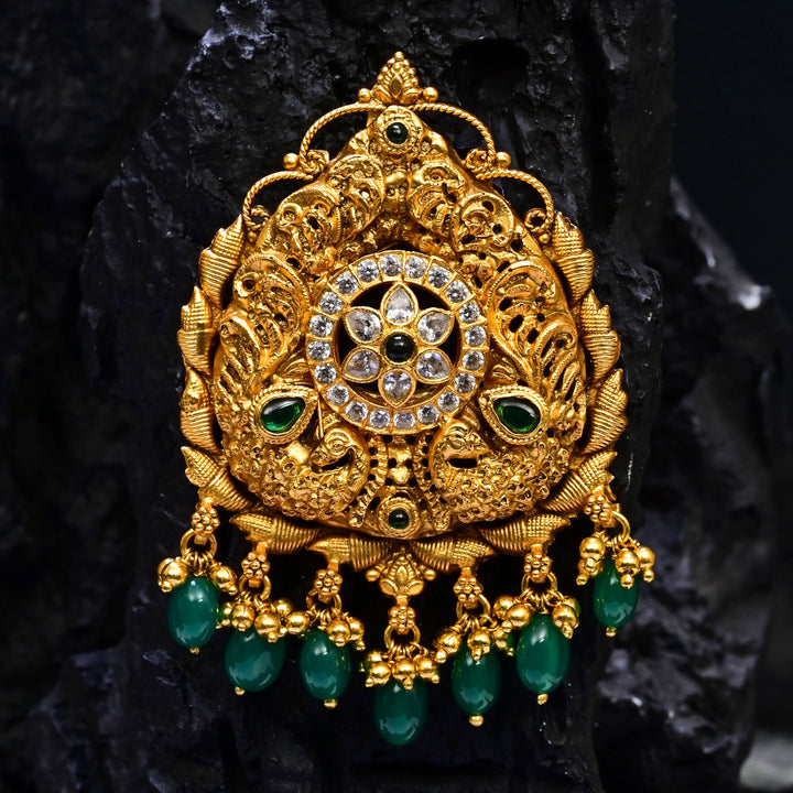 Premium 92.5 silver temple pendant featuring traditional emerald kemp stones antique finish, and intricate handcrafted South Indian design by Sri Fine Jewellery, Hyderabad.
(https://www.srifinejewellery.com)