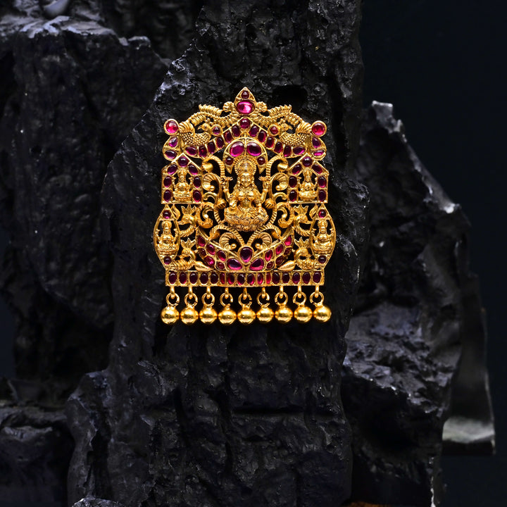 Premium 92.5 silver temple pendant featuring traditional ruby kemp stones, Lakshmi motif, antique finish, and intricate handcrafted South Indian design by Sri Fine Jewellery, Hyderabad.
(https://www.srifinejewellery.com)