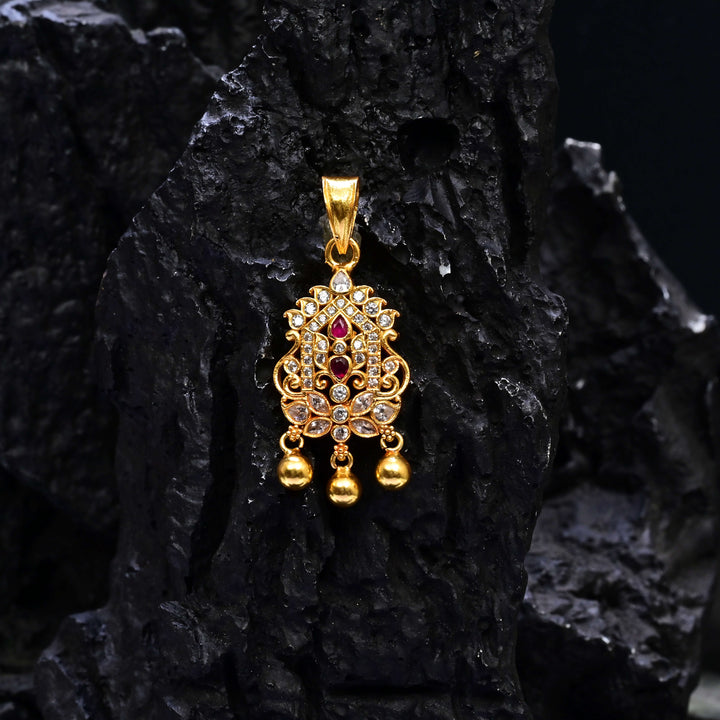 Premium 92.5 silver temple pendant featuring traditional ruby kemp stones, antique finish, and intricate handcrafted South Indian design by Sri Fine Jewellery, Hyderabad.
(https://www.srifinejewellery.com)