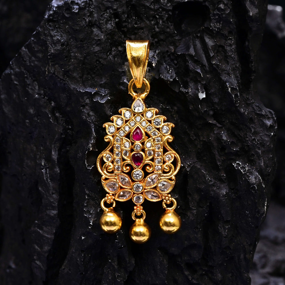 Premium 92.5 silver temple pendant featuring traditional ruby kemp stones, antique finish, and intricate handcrafted South Indian design by Sri Fine Jewellery, Hyderabad.
(https://www.srifinejewellery.com)