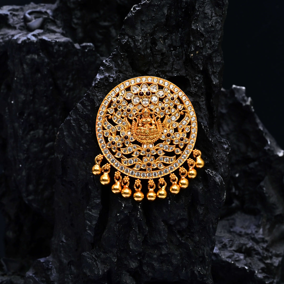 Premium 92.5 silver temple pendant featuring traditional Lakshmi motif, ruby kemp stones, antique finish, and intricate handcrafted South Indian design by Sri Fine Jewellery, Hyderabad.
(https://www.srifinejewellery.com)