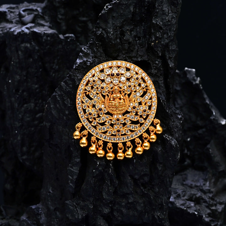 Premium 92.5 silver temple pendant featuring traditional Lakshmi motif, ruby kemp stones, antique finish, and intricate handcrafted South Indian design by Sri Fine Jewellery, Hyderabad.
(https://www.srifinejewellery.com)